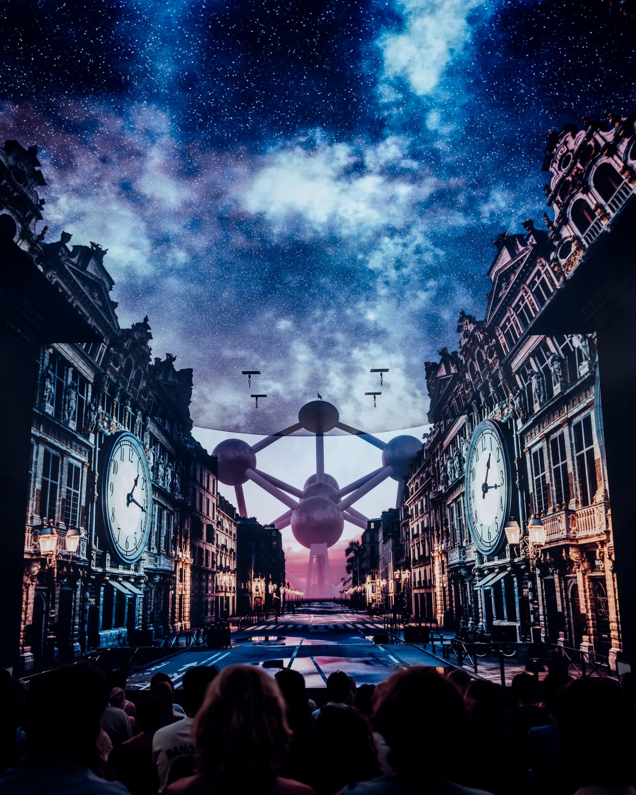 An immersive night-time projection show above a Brussels street, with giant clock faces and a starry sky over the Atomium, watched by a seated audience.